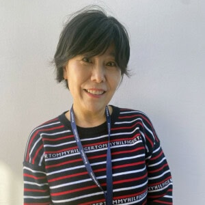 Juja Kim, profile photo of Asian woman in a pinstriped sweatshirt