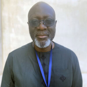 Michael Ojo, profile photo of Nigerian man in a traditional outfit